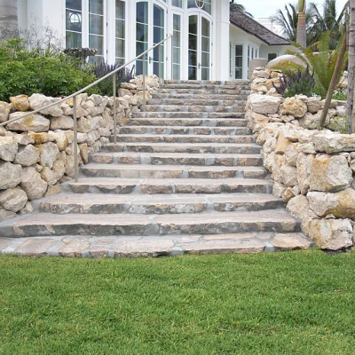 STAIRCASE WITH BOULDER WALL